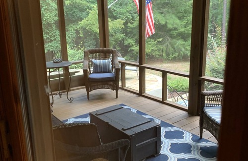 Henderson House | Celebrate Spring! Beautiful, custom Kerr Lake lodge home + private dock.