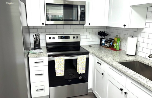 Westminster House | Central 5-BR Retreat with Basement Kitchenette & Convenient Freeway Access