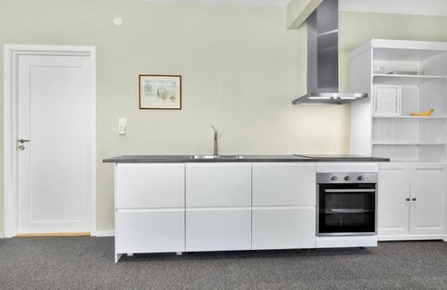 Stavanger Apartment | Central Apartment. Calm street. Backyard. Is situated in Stavanger.nnn