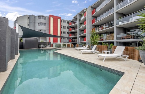 Bowen Hills Apartment | Central Bowen Hills Stay with Pool Access