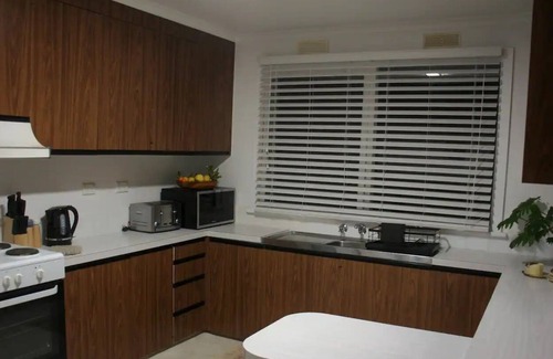 Hamilton House | Central Comfort for Work or Family two Living Spaces and Room to Run!