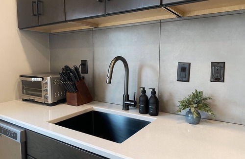 Traverse City Condo | Central Contemporary Condo with Parking!