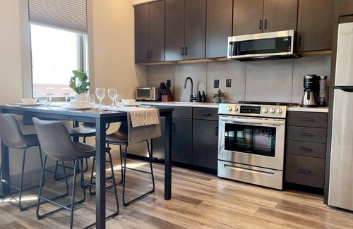Traverse City Condo | Central Contemporary Condo with Parking!