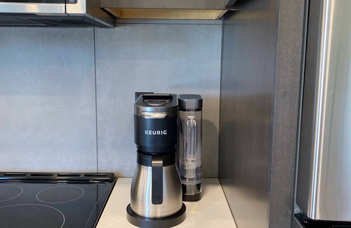 Traverse City Condo | Central Contemporary Condo with Parking!