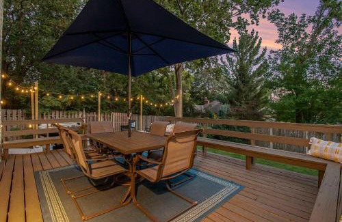 West Omaha House | Central Family Oasis with Hot Tub & Fenced Yard