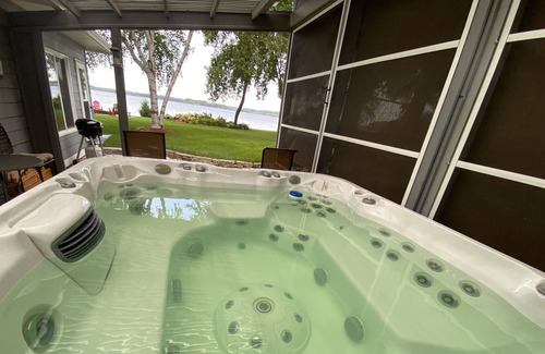 Hutchinson House | Central MN 4romantic ensuites jacuzzi beach sunset views pontoon handicap acc.