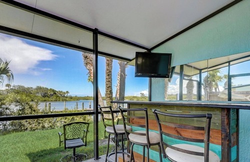 New Smyrna Beach Condo | Centrally located 2 Bedroom, 1 bath Water front condo in New Smyrna Beach!