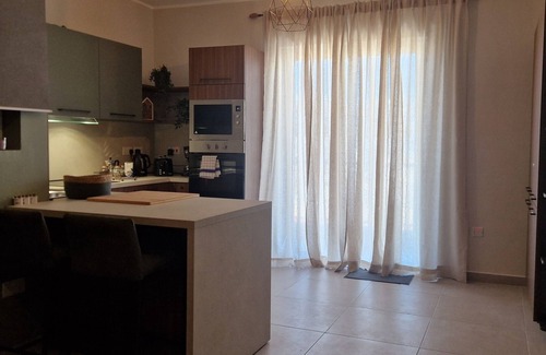Qawra Apartment | Centrally located, well equipped, stylish flat.with sea views n