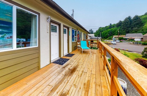 Winchester Bay Condo | Centrally located condo w/ large deck - near the dunes, 1 dog OK!