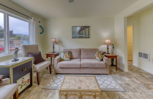 Winchester Bay Condo | Centrally located condo w/ large deck - near the dunes, 1 dog OK!