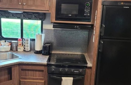 Greene County House | Centrally located Cozy RV- Pet Friendly Bunkhouse