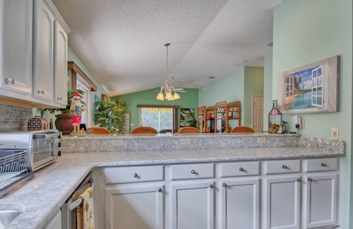 Mallory Square House | Centrally Located Pool Home with Golf Cart near Lake Sumter Landing!