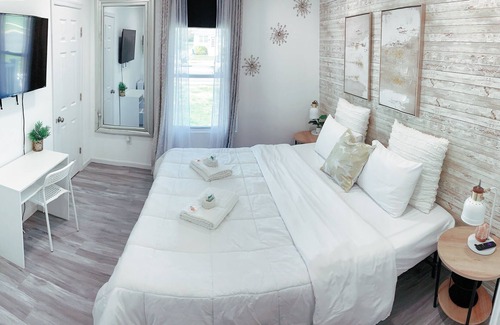 Dover House | Centric & spacious home with ample parking and king beds in all rooms.