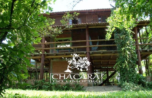 Antonina House | Chacara with incredible house on the edge of the river in Antonina, PR -