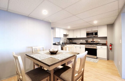 Ingleside Apartment | Chain O' Lakes Beach Penthouse Sunset View and Boat Dock