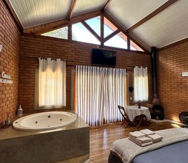 Sapucai-Mirim Ski Chalet | Chalé Jacarandá - Hidro - Wifi e mais