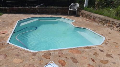 Broederstroom Ski Chalet | Chalet 2 Camping Style at Cynthias Country Outside bathrooms