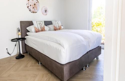 Municipality of Veldhoven Ski Chalet | Chalet by Pond in Holiday Park