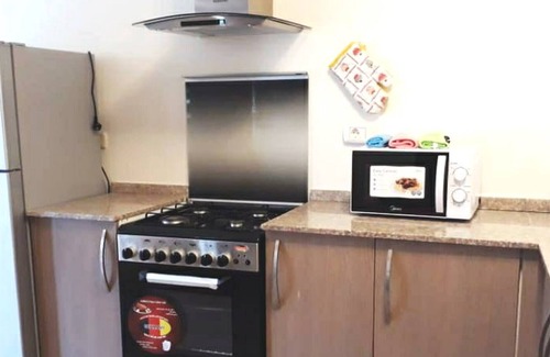 Batroun Ski Chalet | Chalet In Batrouna Parc-gazon-pool-new Resort