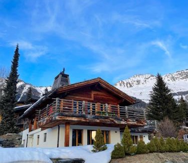 Verbier Ski Chalet | Chalet Les Moulins 5 chambres cheminée piscine sauna parking privé