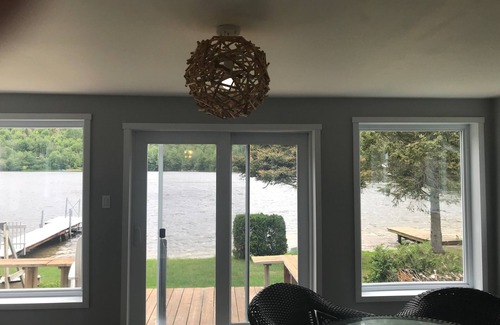 L'Anse-Saint-Jean Ski Chalet | Chalet on the side of water in a beautiful village