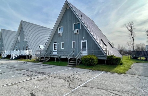 Stevensville House | Chalet on the Lake 56 w/Beach Access, Pools, Sport Courts, Fishing Pond & more!