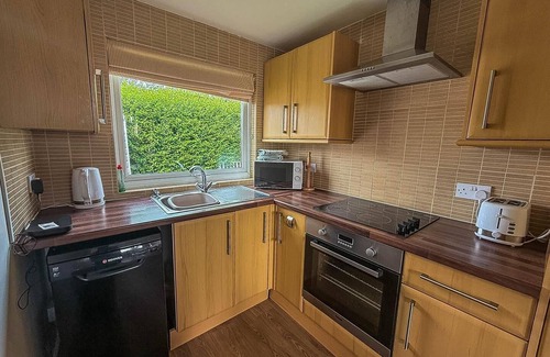Bacton Ski Chalet | Chalet with free WiFi at Rainbows End near a lovely Norfolk beach ref 31002R