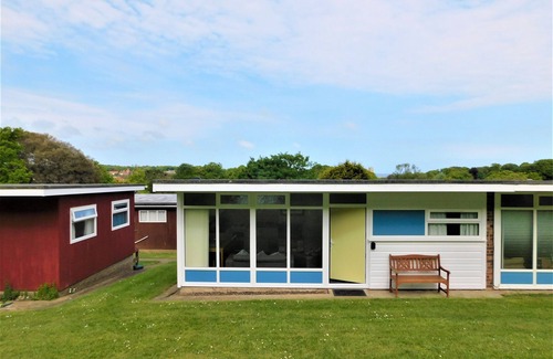 Cromer Ski Chalet | Chalet with open planned kitchen/living area, benefiting from direct access to fantastic cliff walks