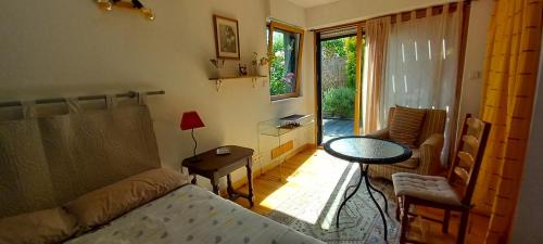Quartier Francisco-Ferrer - Landry - Bourgeois - Poterie House | Chambre avec terrasse Chez Anne