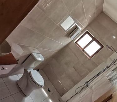 Limbe Apartment | Chambre de luxe chez FOUR IN ONE Résidence