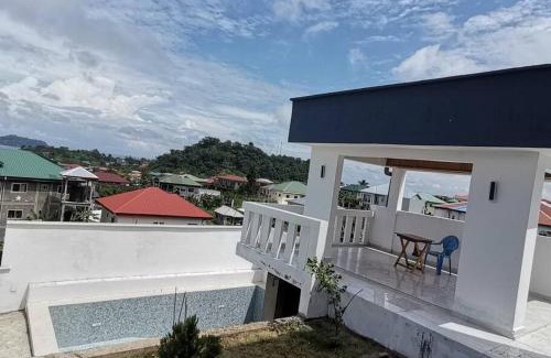 Limbe Apartment | Chambre de luxe chez FOUR IN ONE Résidence