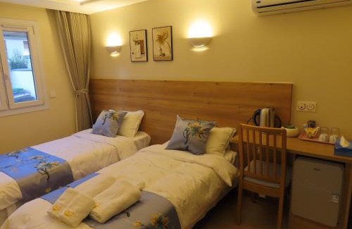 Bondy House | Chambre deux lits séparés