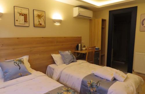 Bondy House | Chambre deux lits séparés