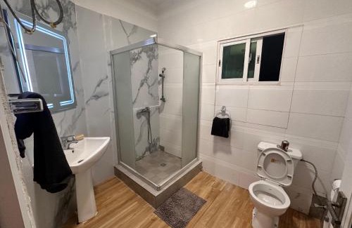 Pointe-Noire Apartment | Chambre salon meublé au Wharf