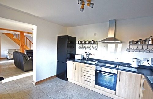Pentney Cottage | Character 4 bedroom lodge with hot tub in a beautiful 1/4 acre setting.