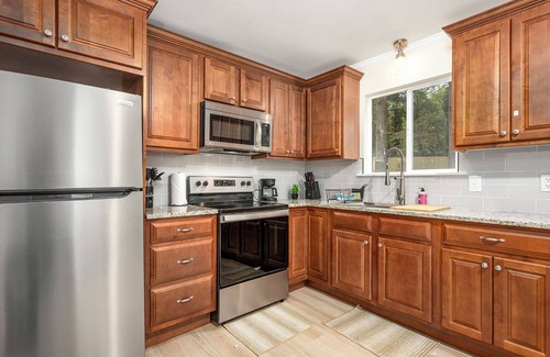 Toddville Road House | Charlottle Jacuzzi side oasis