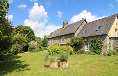 Tinchebray-Bocage Cottage | Charming Historic Stone House with Garden, Fireplace, and Electric Car Charging