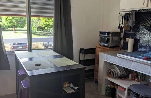 Dangriga Apartment | Charming 1-bed Apt, rooftop bar & splash pool, AC, WiFi, Very Private