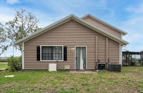 Riverview House | Charming 1-bedroom bungalow with WiFi and fitness room nin Riverview