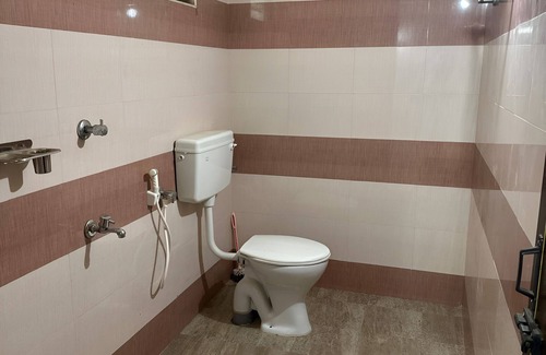 Quilandi House | Charming 1-bedroom house in Koyilandy with WiFi access