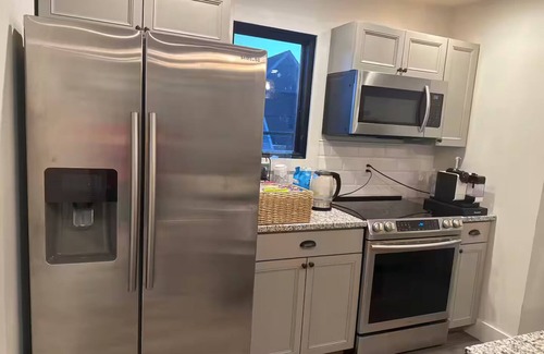 Herron Morton Apartment | Charming 1-bedroom carriage house apartment with private garage