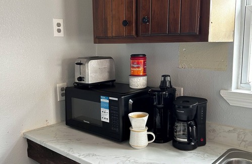 Tulane - Gravier Condo | Charming 1-bedroom duplex within steps from Canal Streetcar in New Orleans WiFi