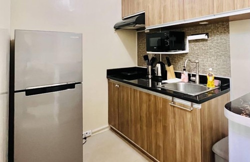 Mandurriao Condo | Charming 1BR Condo with Pool Access