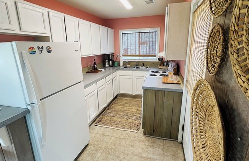 Cherry Grove Beach House | Charming 2-bedroom bungalow in brilliant North Myrtle Beach with sunset views