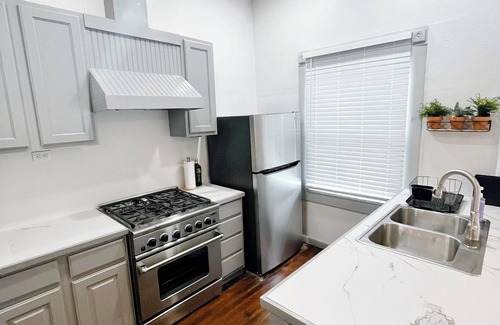 Central City House | Charming 2 Bedroom House & Rear Apt 1/1 with CC Bay View!
