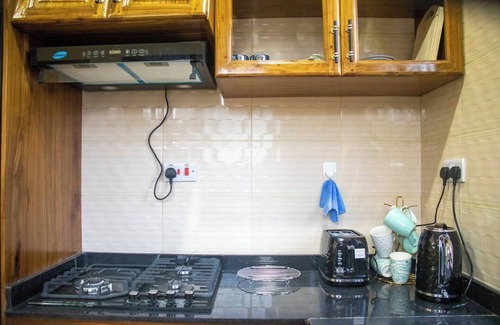 Mikocheni House | Charming 2-bedroom house in beautiful Mbezi Beach, Dar es Salaam with WiFi, AC