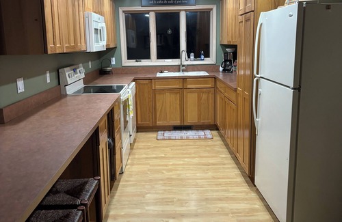 Mullett Lake House | Charming 2-bedroom 1-full bath upstairs house less than 1/2 mile to Mullett Lake