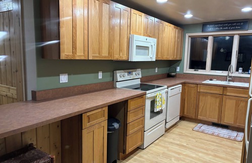 Mullett Lake House | Charming 2-bedroom 1-full bath upstairs house less than 1/2 mile to Mullett Lake
