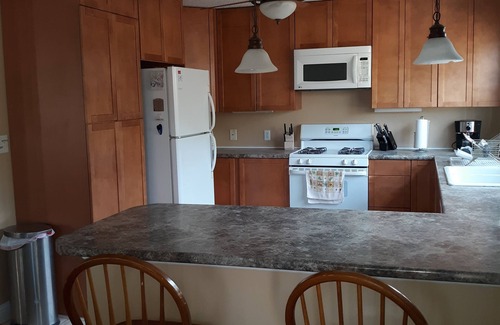 Long Beach Apartment | Charming 2-bedroom apartment in serene Oak Island with AC, WiFi