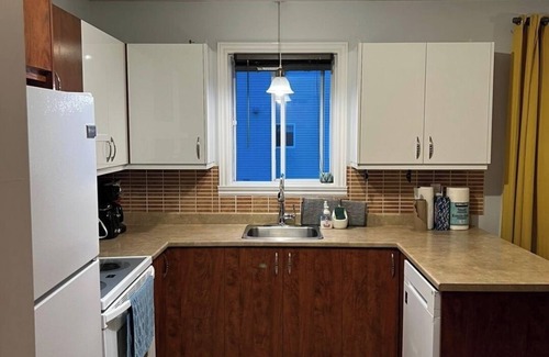 Laval Apartment | Charming 2-bedroom apartment with WiFi, AC in peaceful Laval